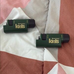 Two Kids Green Celestron On the Go Microscope